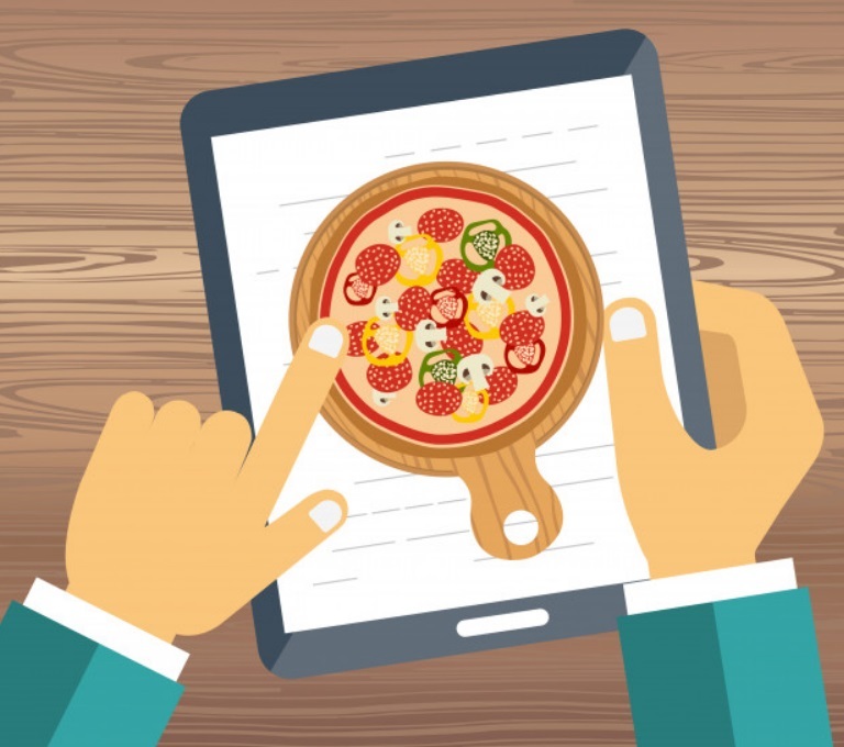 digitalisation : une pizzeria moderne avec borne de commande digitale